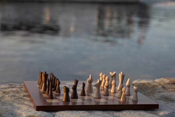 Chessplus chess set on water's edge